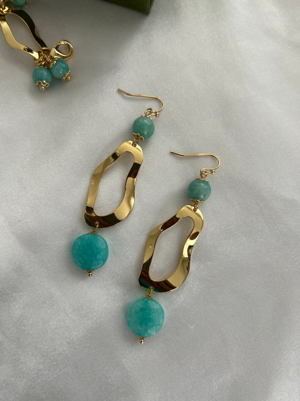 Gold curve earrings